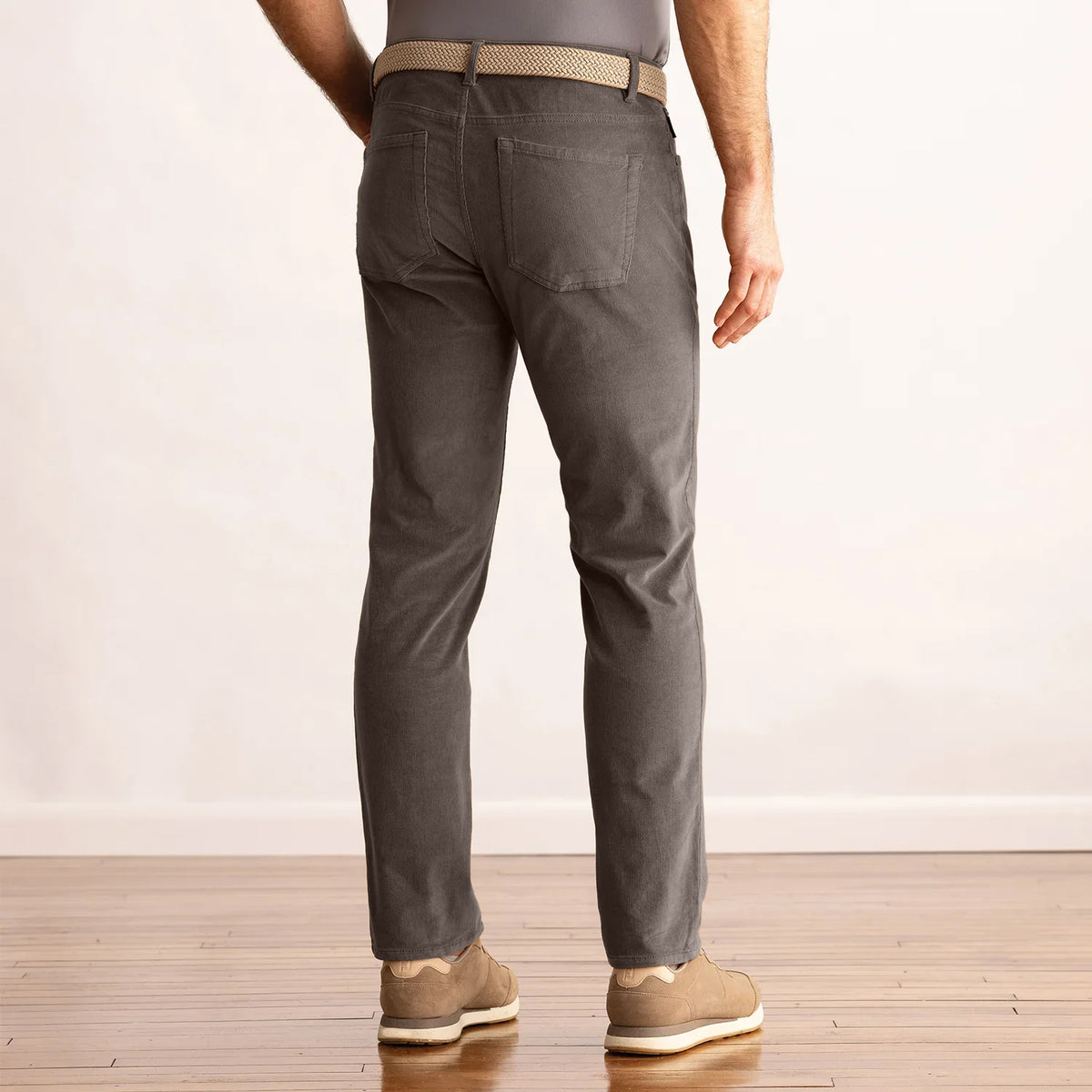 Model wearing the Dunning Seabury Corduroy Performance Pant in Mink, back view.