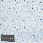 Textured Cashmere Blue fabric with blue and black speckles and 'Dunning' brand label.