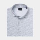 A folded light Micro-Chip gray and white micro-patterned polo shirt with a collar and button placket, shown on a plain light gray background.