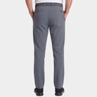 Model wearing the Dunning Precision Insulated Pant in Anchor, back view.