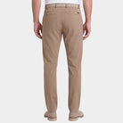 Model wearing the Dunning Precision Insulated Pant in Dark Khaki, back view.