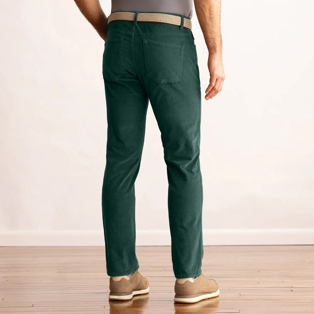 Model wearing the Dunning Seabury Corduroy Performance Pant in Poker Green, back view.